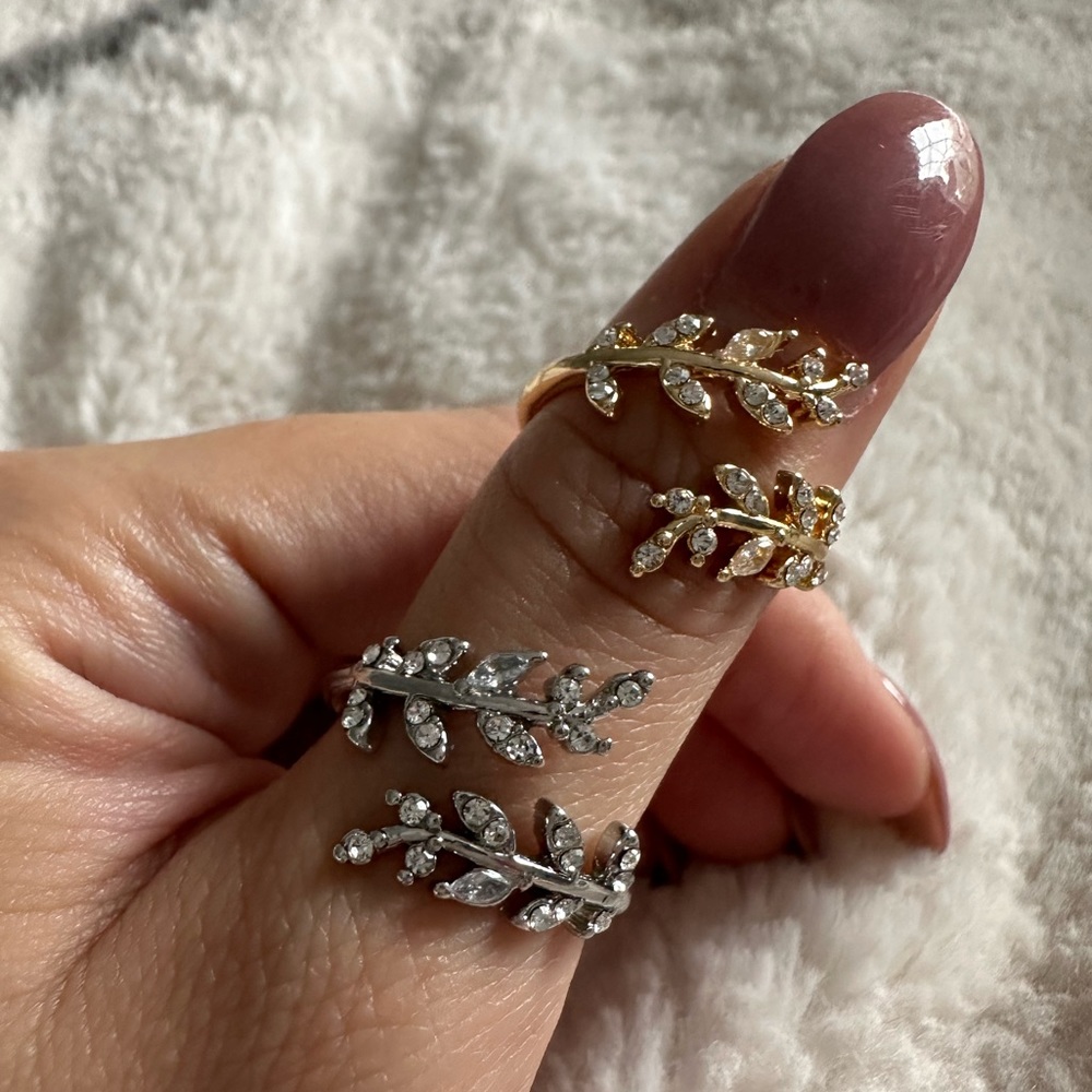 Gorgeous adjustable gold wrapped leaf design open band ring